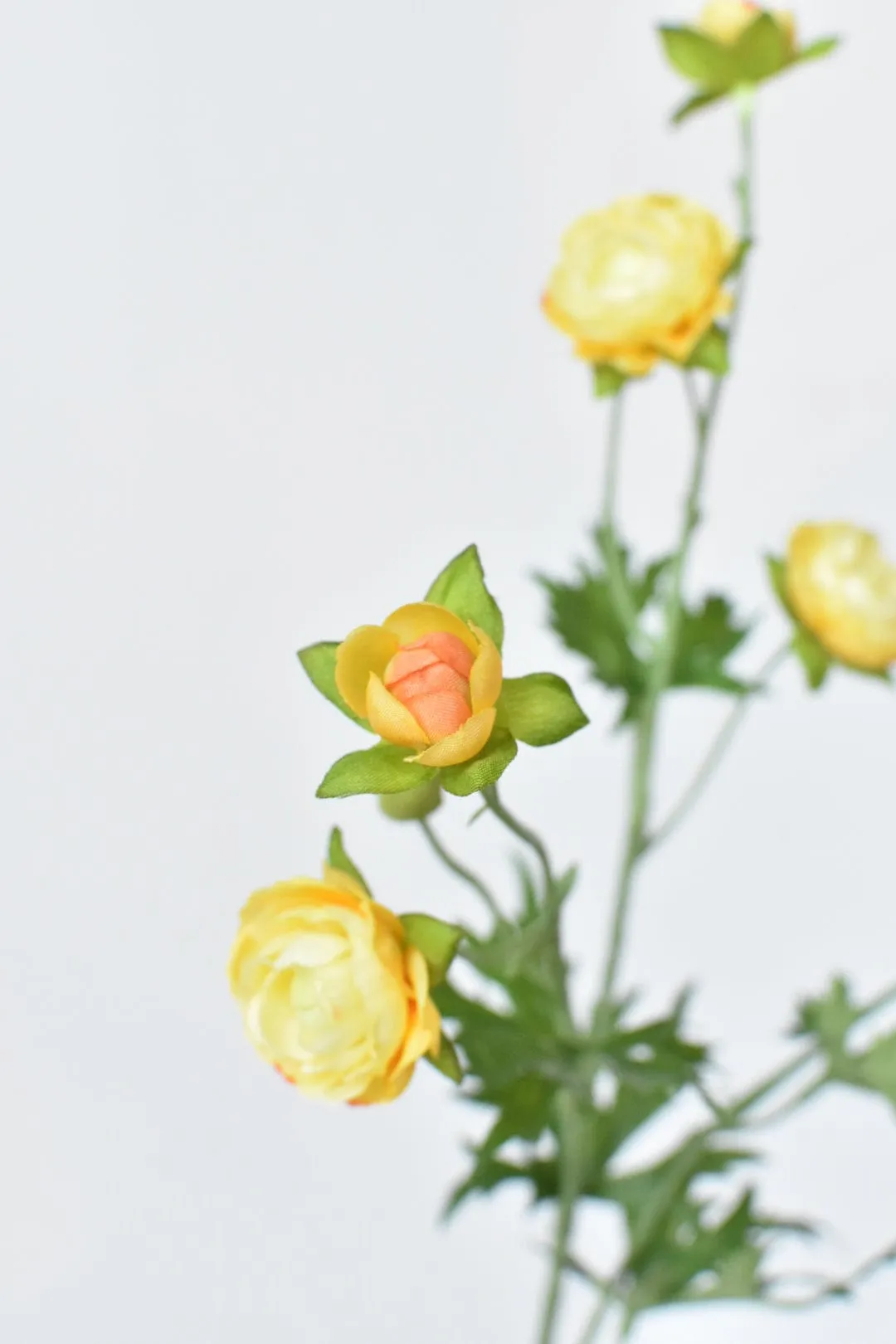 22" Faux Mini Yellow Ranunculus Stem